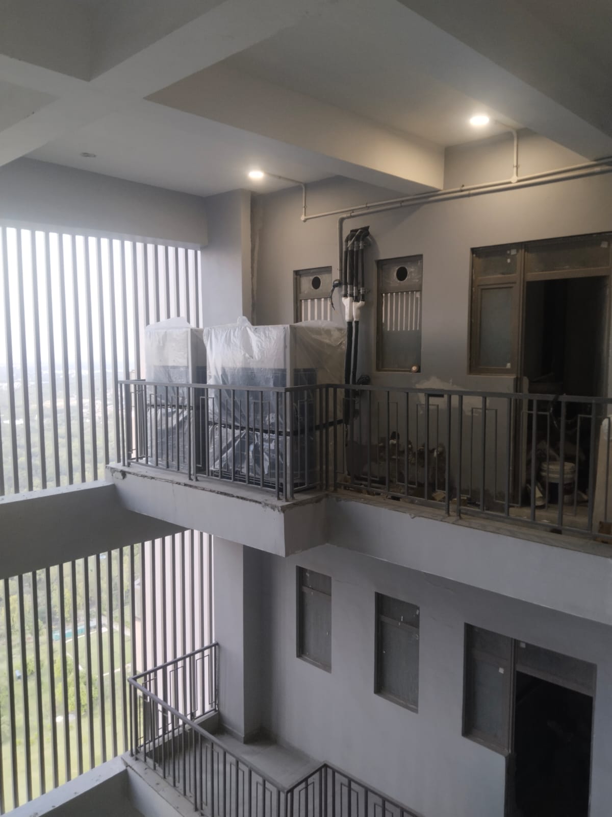 Building courtyard with installed outdoor AC equipment